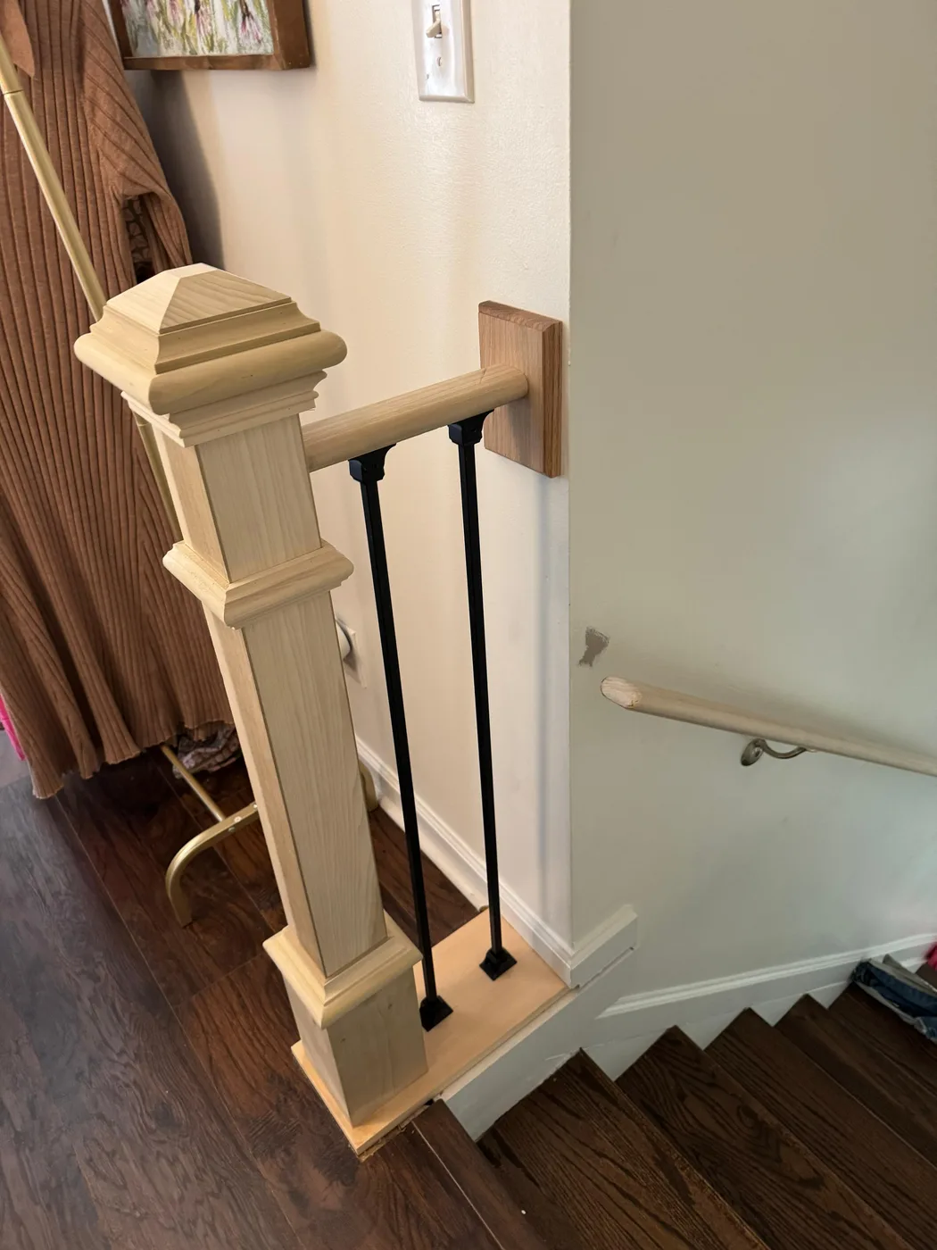 Stair landing with updated railing work